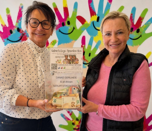 Übergabe einer Guardian Hand Spendenbox